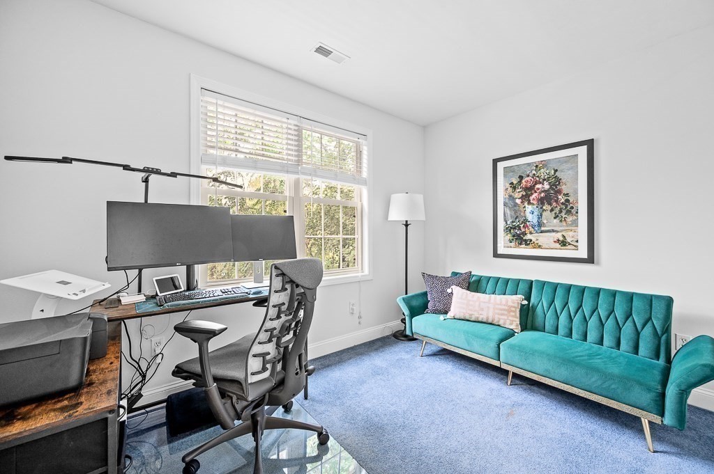 3 Carter Way Worcester, MA 01609 - Photo 22 of 41 a living room with furniture and a window