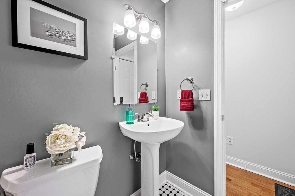 3 Carter Way Worcester, MA 01609 - Photo 26 of 41 a bathroom with a sink and a mirror