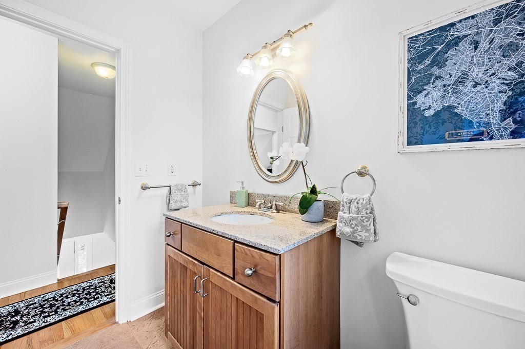 3 Carter Way Worcester, MA 01609 - Photo 29 of 41 a bathroom with a sink a toilet and a mirror