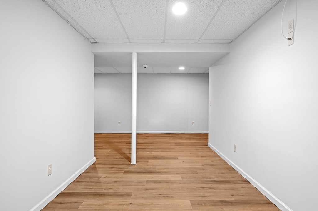 3 Carter Way Worcester, MA 01609 - Photo 34 of 41 a view of an empty room with wooden floor