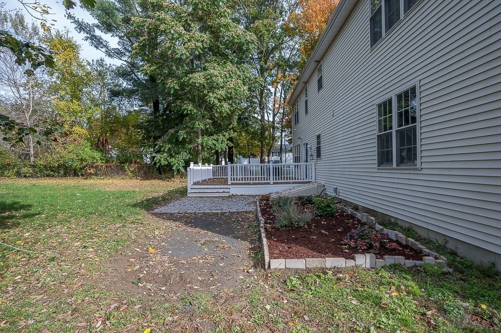 3 Carter Way Worcester, MA 01609 - Photo 41 of 41 a view of a house with backyard and a garden