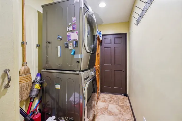 a view of a swimming pool with sitting area