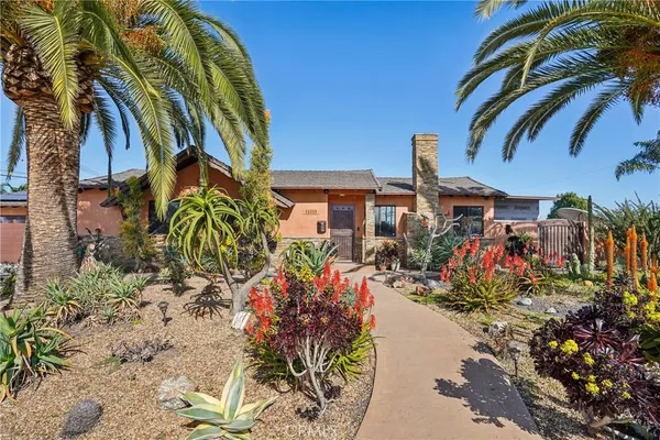 a view of a backyard with a house