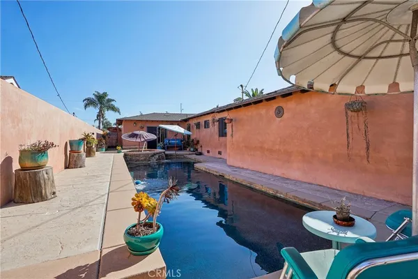a house view with a garden space