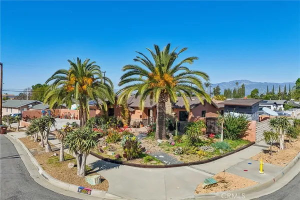 an aerial view of residential building and trees