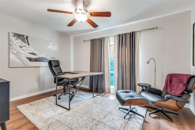 a workspace with furniture and a window