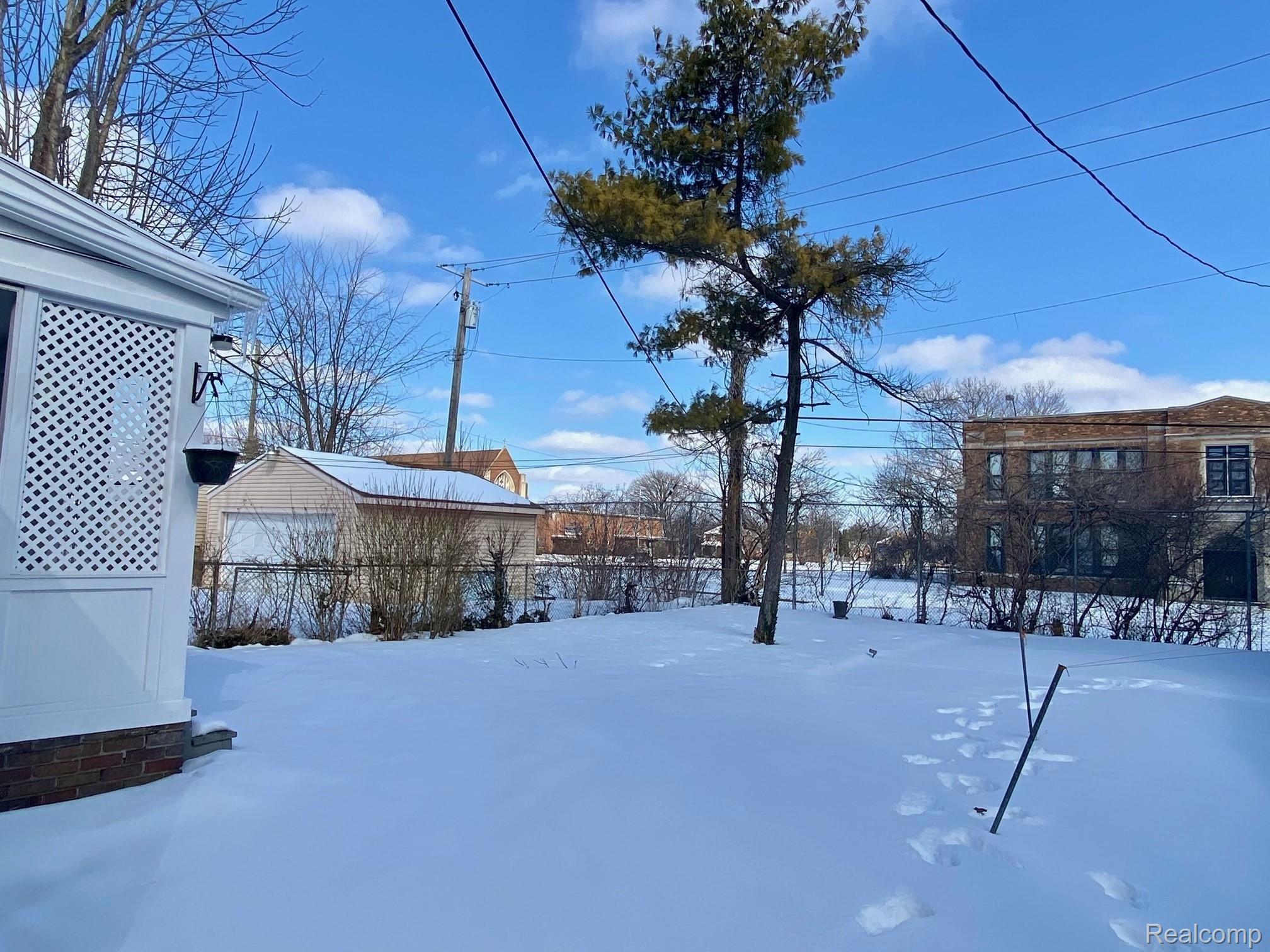 5590 Balfour Road Detroit, MI 48224 - Photo 21 of 32 6.1 Back Yard-Snow
