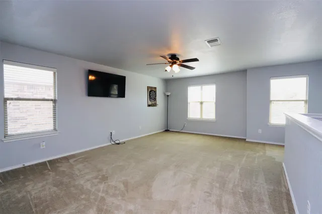 a room with furniture and a window