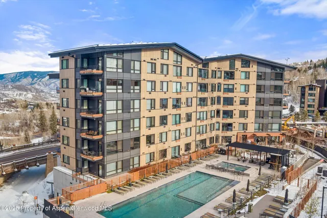 a front view of a building with balcony