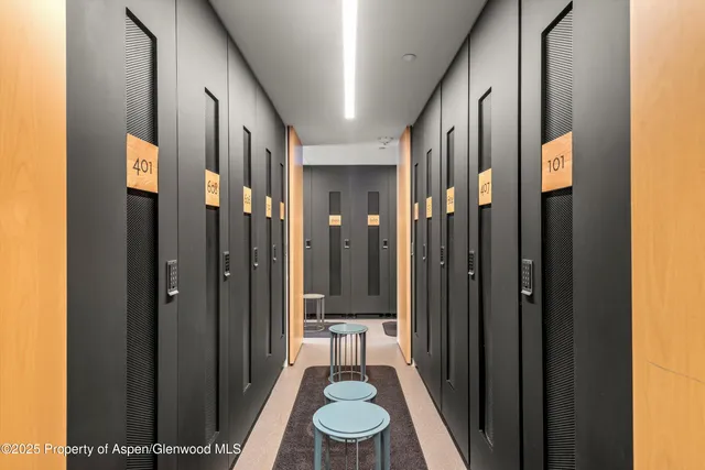 a bathroom with a shower and a sink