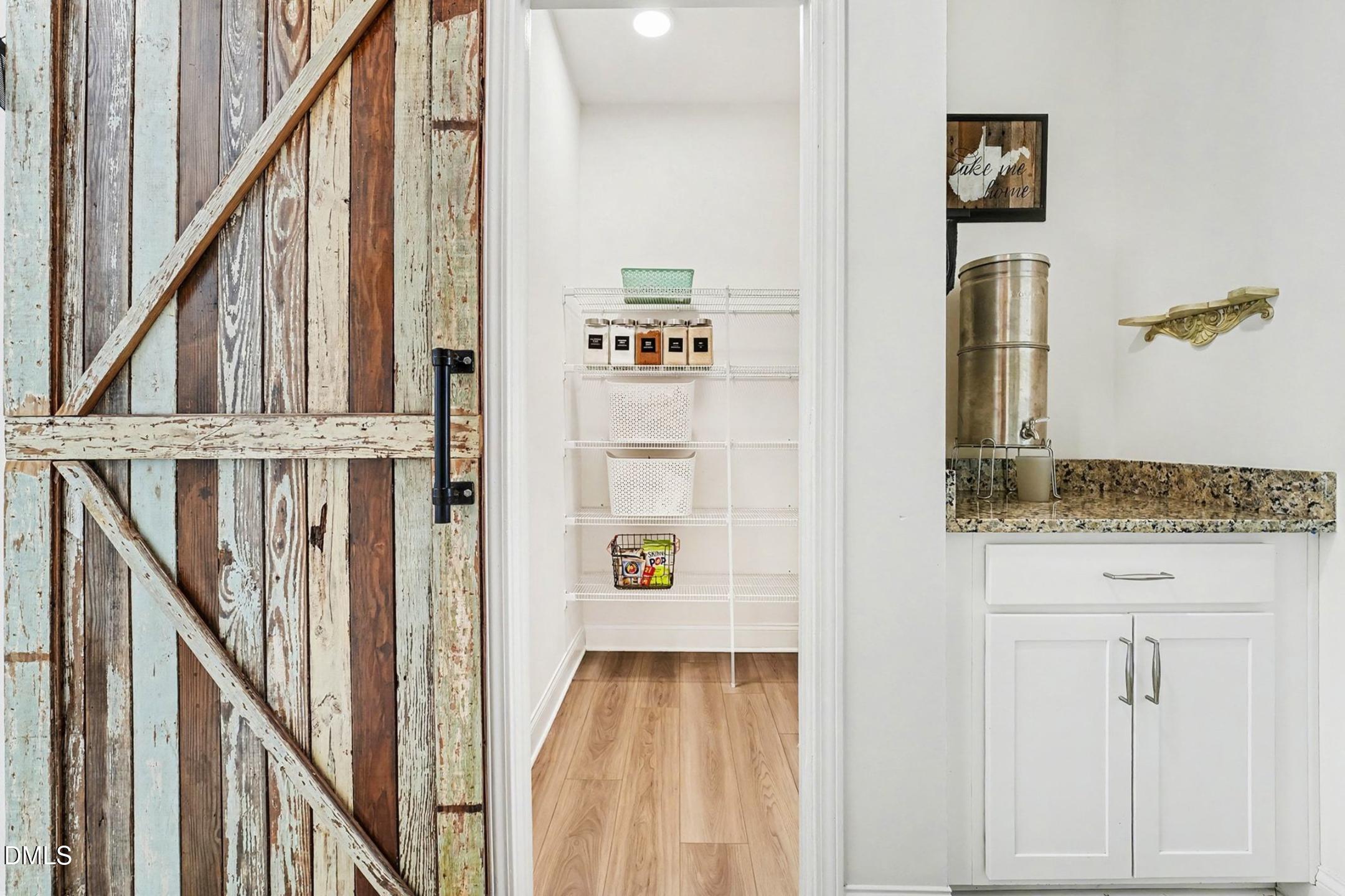 185 Twilight Trail Willow Spring, NC 27592 - Photo 35 of 42 a view of hallway with stairs and wooden floor