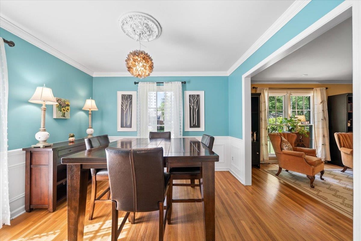 4847 Kaye Road Memphis, TN 38117 - Photo 11 of 40 a view of a dining room with furniture window and wooden floor
