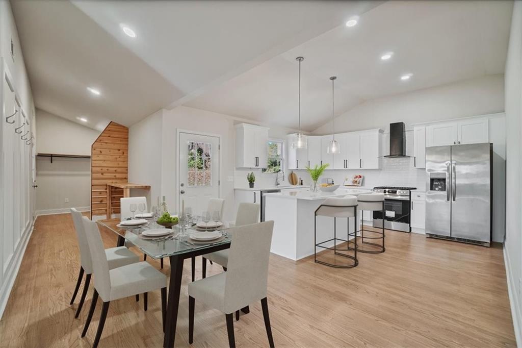3062 Katherine Valley Road Decatur, GA 30032 - Photo 16 of 61 a view of kitchen with refrigerator and wooden floor