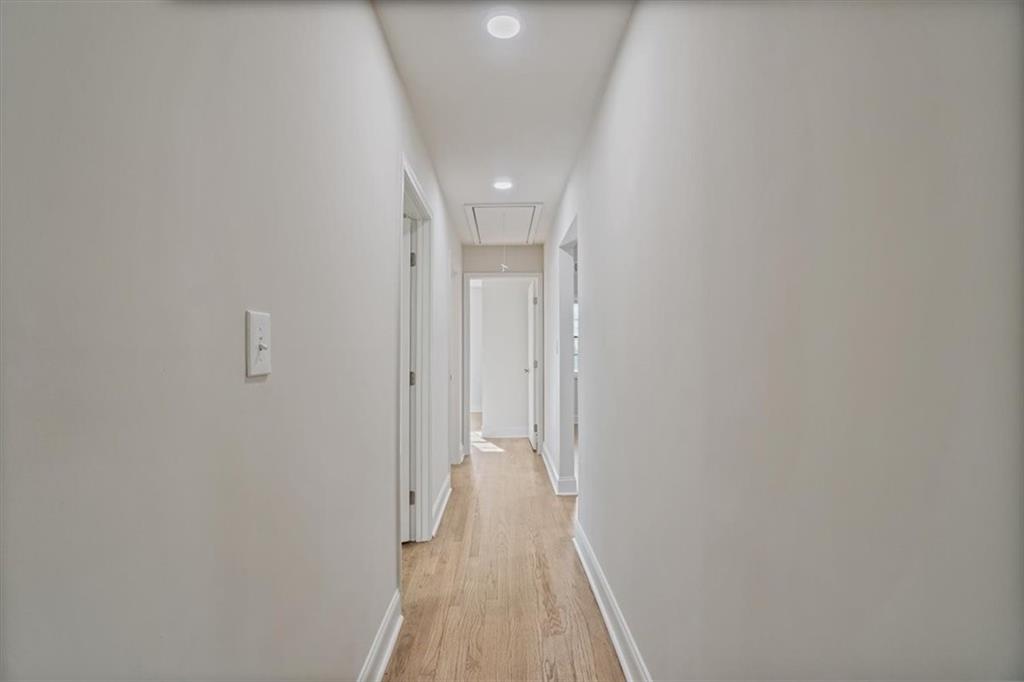 3062 Katherine Valley Road Decatur, GA 30032 - Photo 25 of 61 a view of a hallway with wooden floor