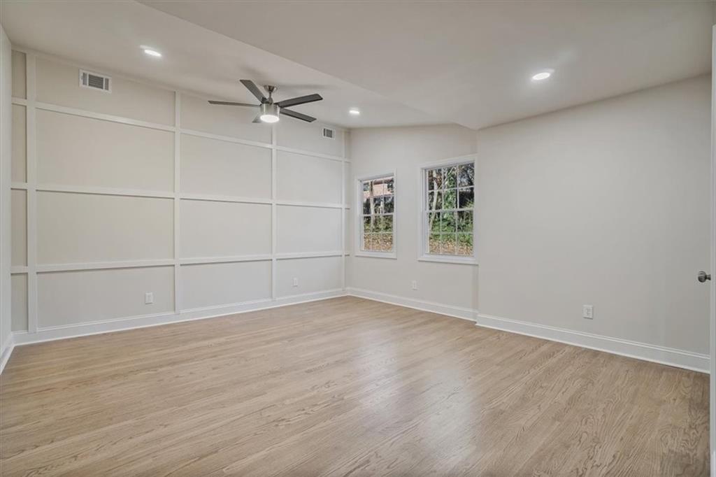 3062 Katherine Valley Road Decatur, GA 30032 - Photo 33 of 61 wooden floor in an empty room with a window