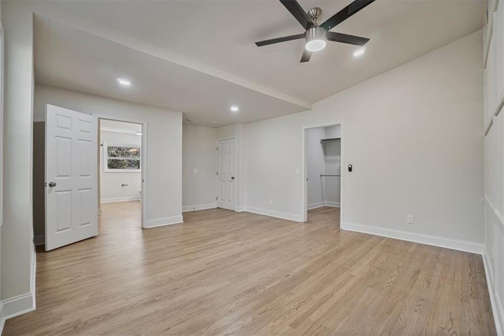 3062 Katherine Valley Road Decatur, GA 30032 - Photo 35 of 61 wooden floor in an empty room with a window