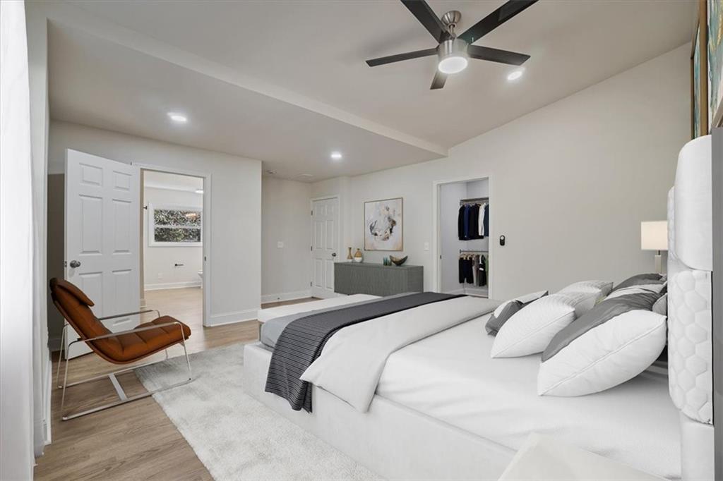 3062 Katherine Valley Road Decatur, GA 30032 - Photo 36 of 61 a bedroom with a bed couch and a window