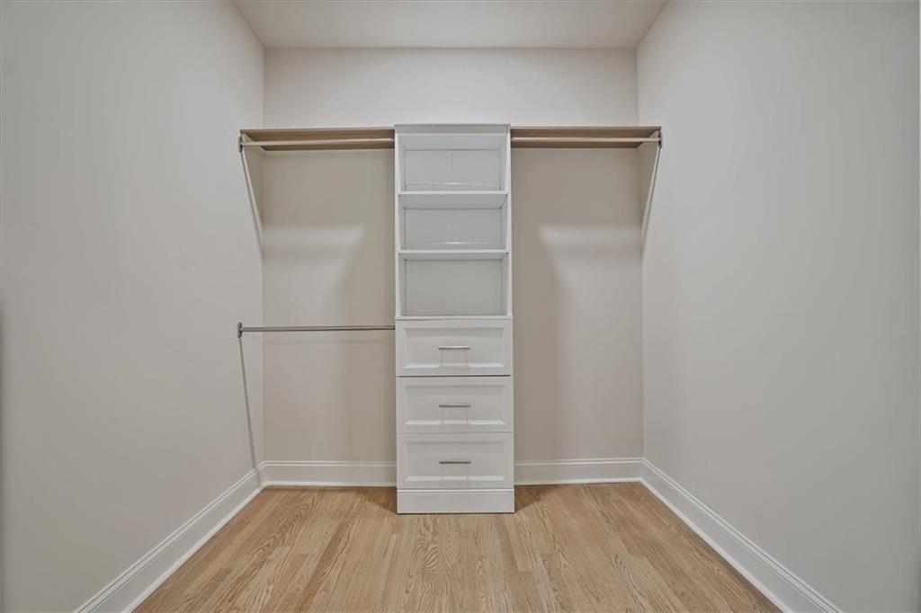 3062 Katherine Valley Road Decatur, GA 30032 - Photo 37 of 61 a view of walk in closet with empty racks