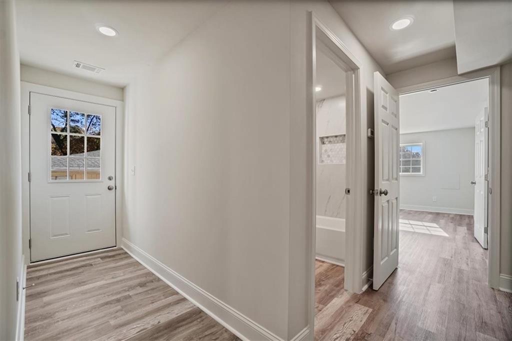 3062 Katherine Valley Road Decatur, GA 30032 - Photo 44 of 61 a view of hallway with wooden floor