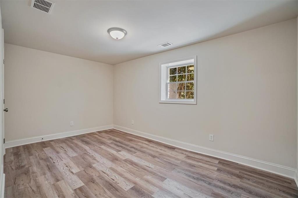 3062 Katherine Valley Road Decatur, GA 30032 - Photo 51 of 61 wooden floor in an empty room