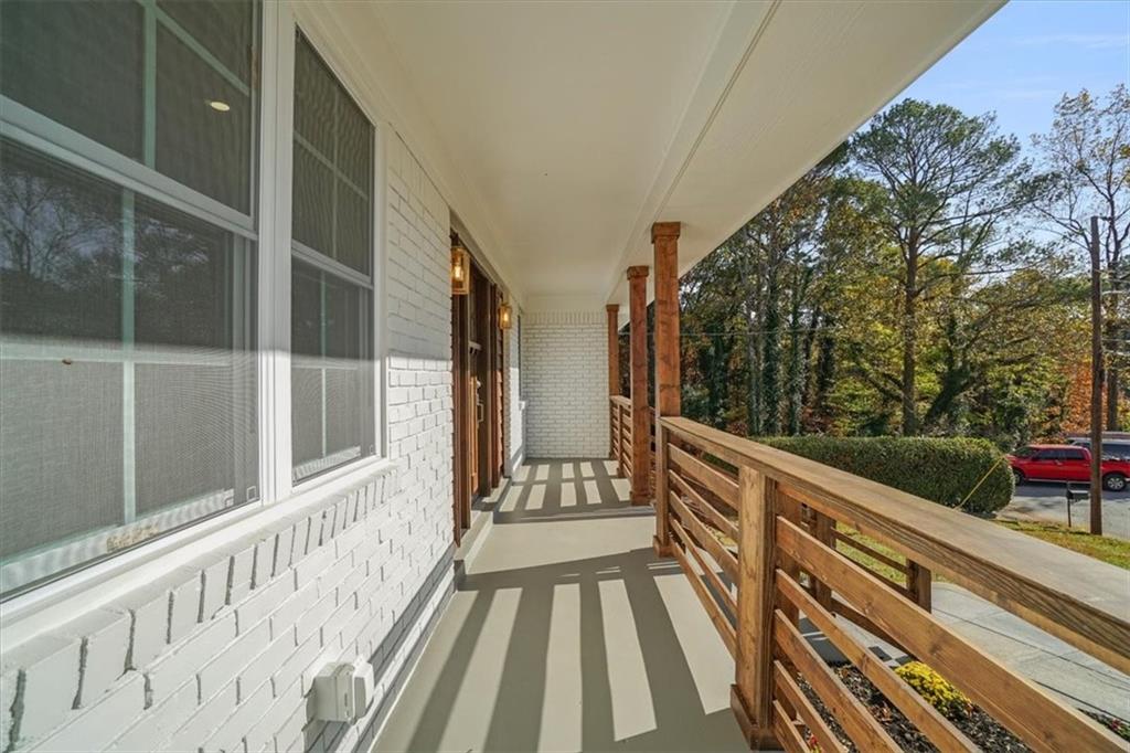3062 Katherine Valley Road Decatur, GA 30032 - Photo 6 of 61 a view of balcony with wooden floor and fence