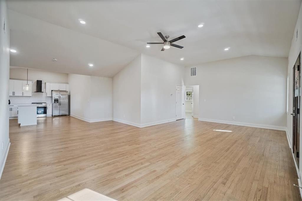 3062 Katherine Valley Road Decatur, GA 30032 - Photo 8 of 61 a view of empty room with wooden floor and window