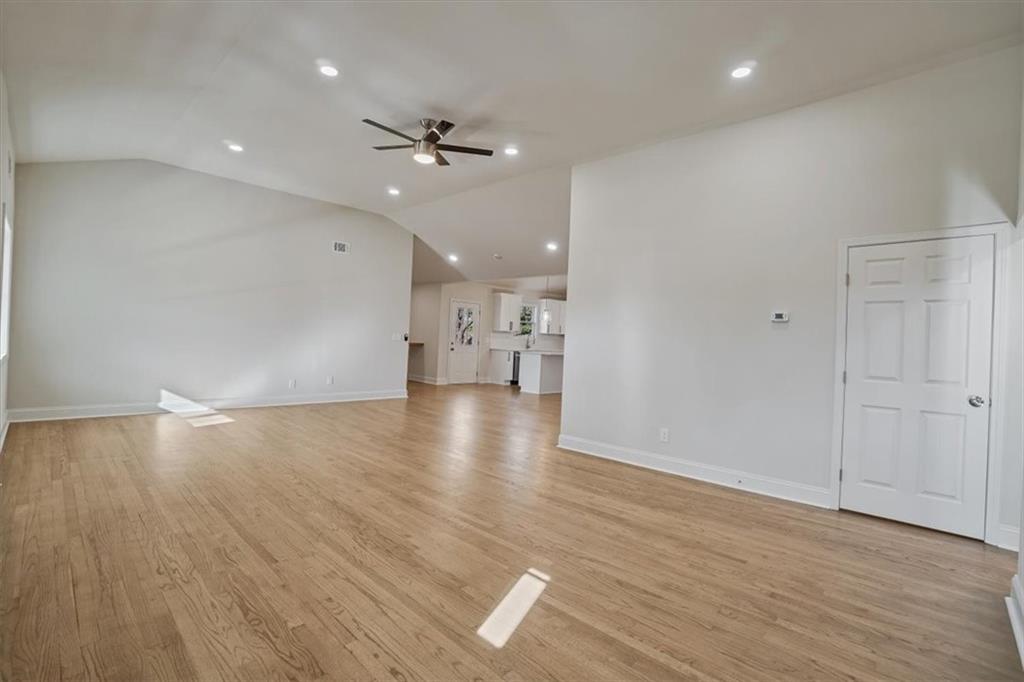 3062 Katherine Valley Road Decatur, GA 30032 - Photo 9 of 61 a view of empty room with wooden floor and window