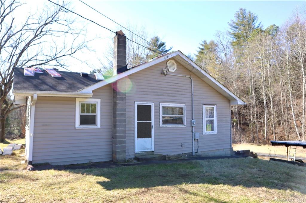 104 Old Fort Road Fairview, NC 28730 - Photo 2 of 10 a view of a house with a yard