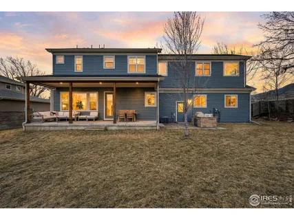 a view of a chairs and table in the patio