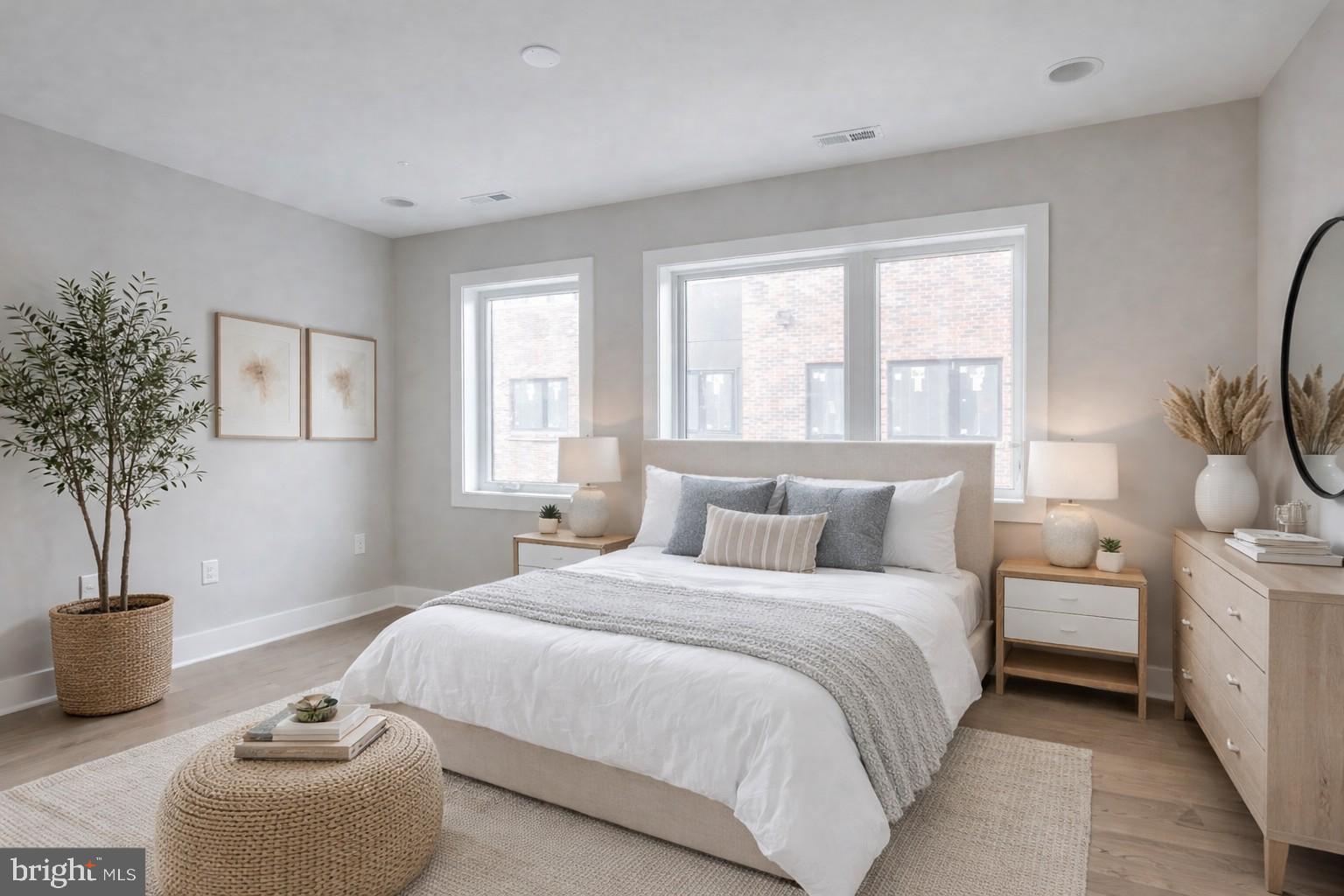 520 Fairmount Avenue Philadelphia, PA 19123 - Photo 14 of 24 a bedroom with bed and a potted plant