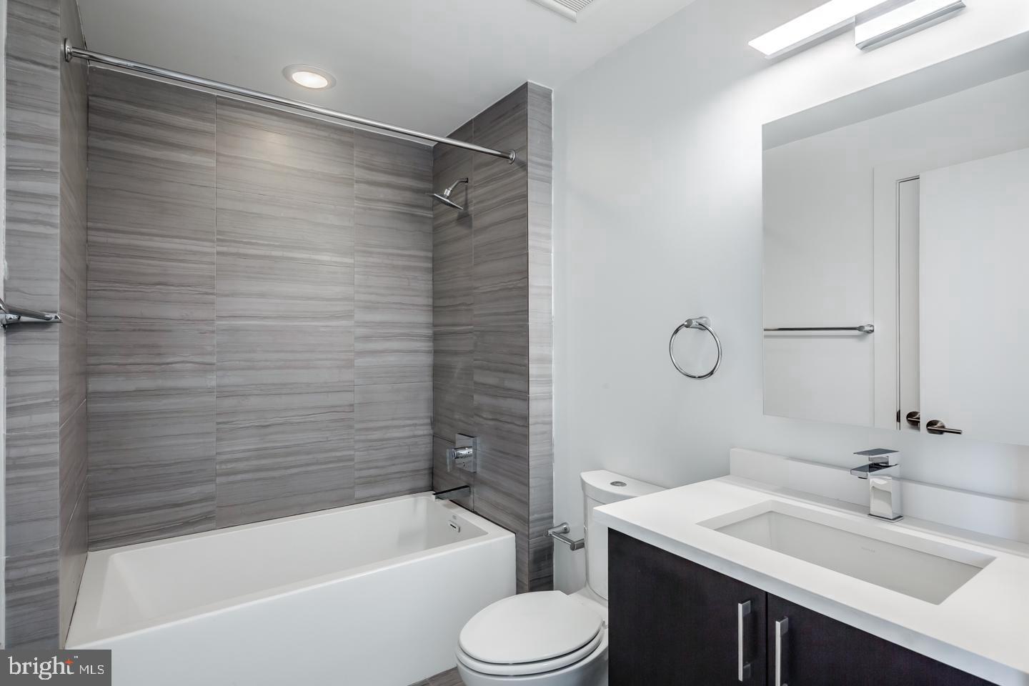 520 Fairmount Avenue Philadelphia, PA 19123 - Photo 15 of 24 a bathroom with a sink toilet vanity and shower