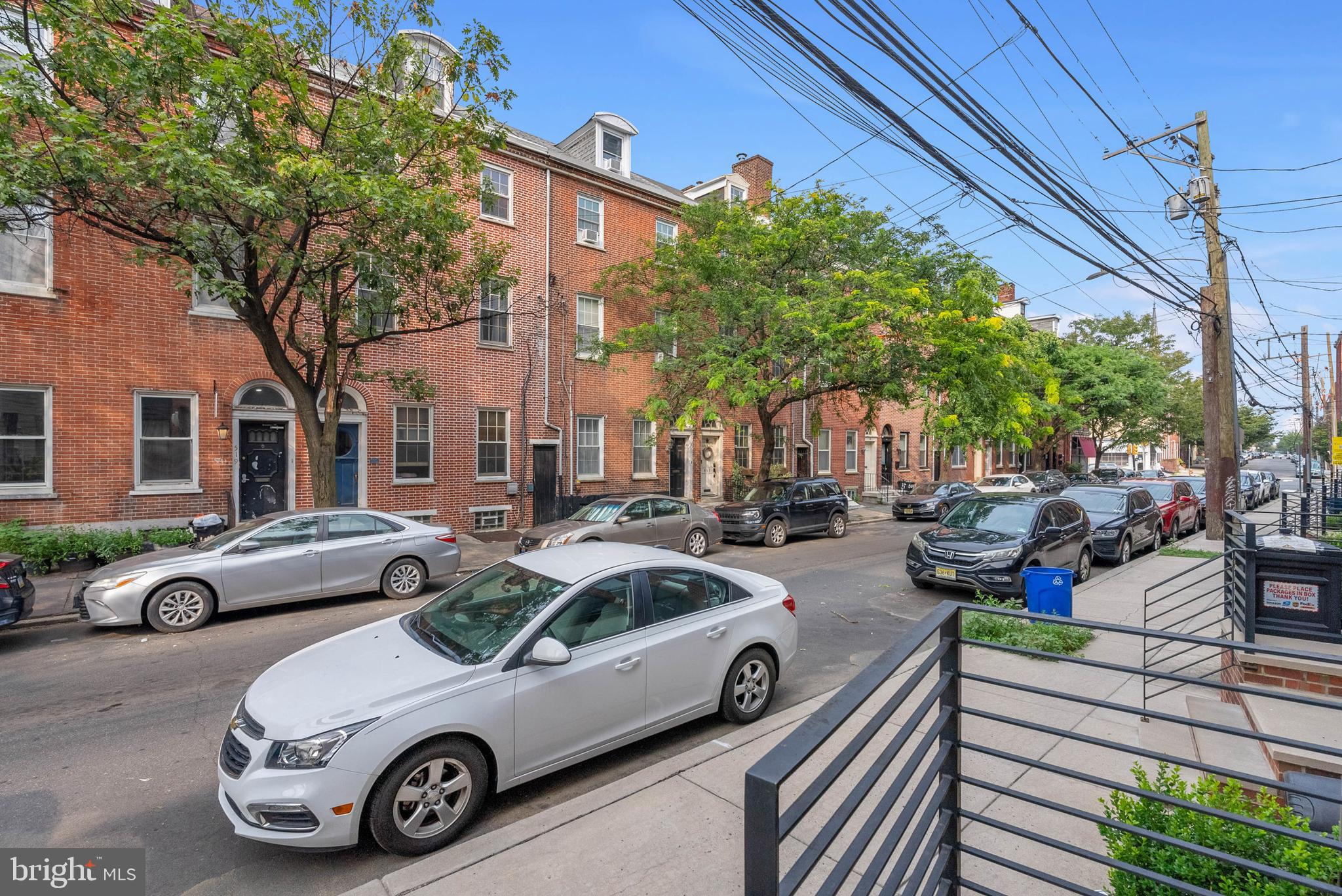 520 Fairmount Avenue Philadelphia, PA 19123 - Photo 21 of 24 a front view of a house with parking space