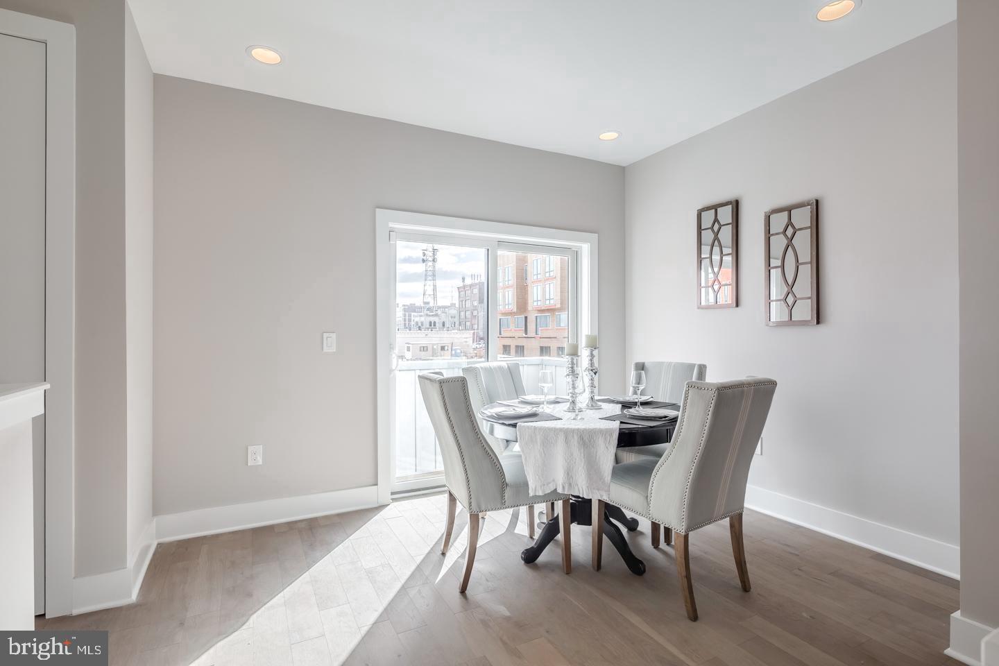 520 Fairmount Avenue Philadelphia, PA 19123 - Photo 5 of 24 a view of a dining room with furniture and wooden floor