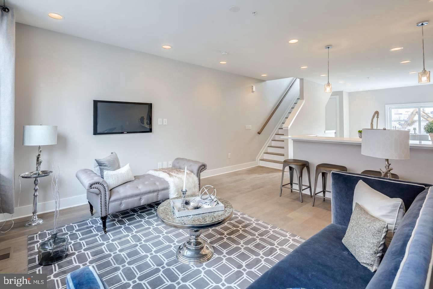 520 Fairmount Avenue Philadelphia, PA 19123 - Photo 6 of 24 a living room with furniture and wooden floor
