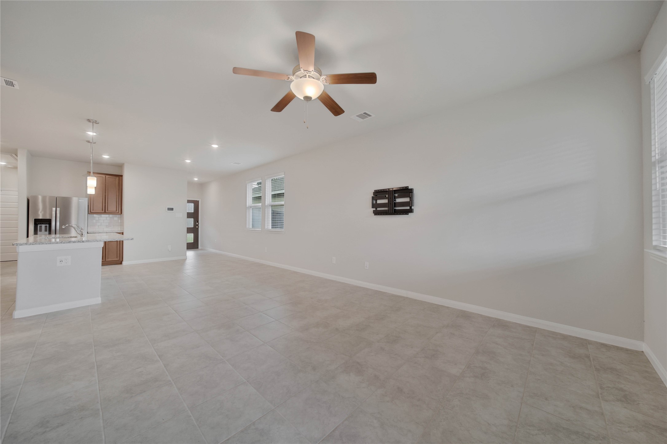 7080 Silverleaf Oak Street Conroe, TX 77304 - Photo 35 of 35 This spacious and open floorplan is easy to love. The high-end flat screen mount will stay with the home.