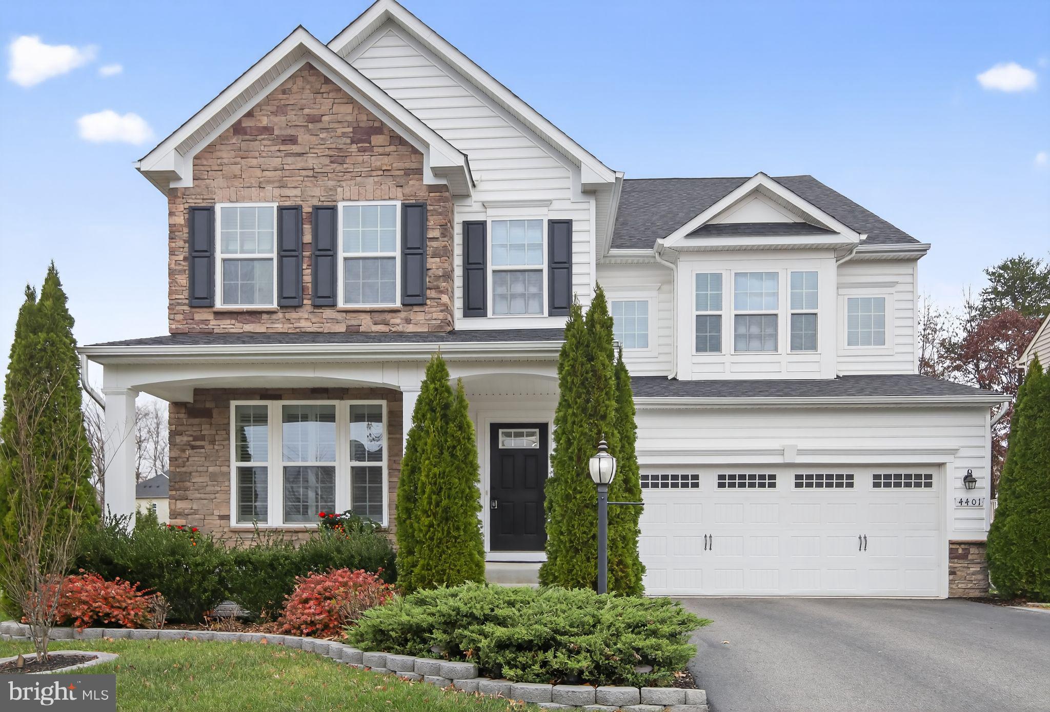 4401 Weejun Loop Woodbridge, VA 22192 - Photo 1 of 35 front view of house with a yard