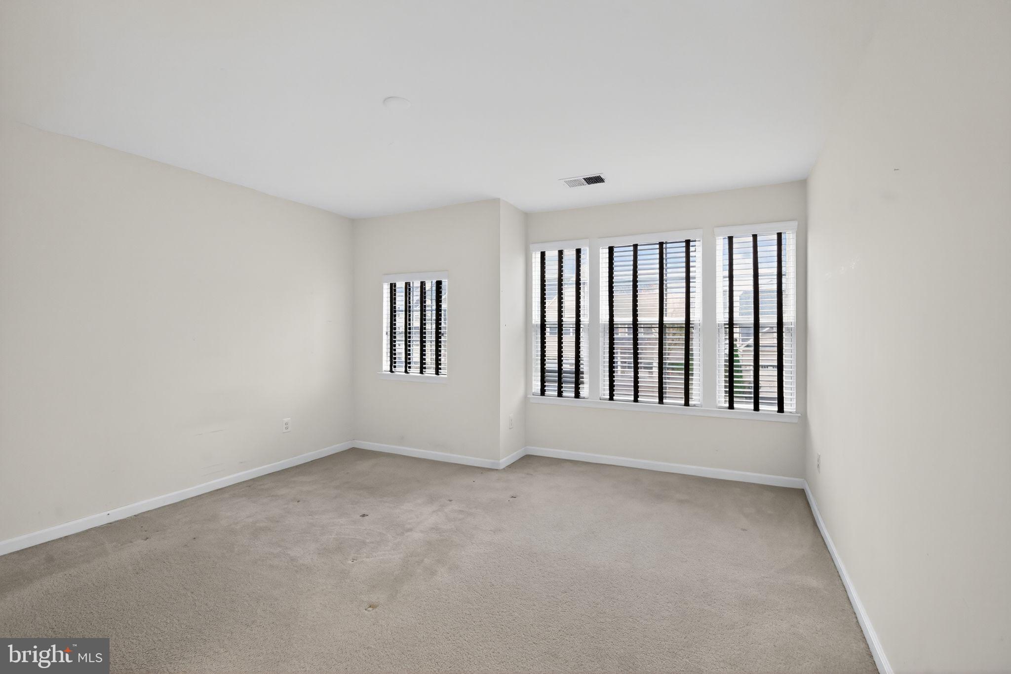 4401 Weejun Loop Woodbridge, VA 22192 - Photo 15 of 35 a view of an empty room with a window