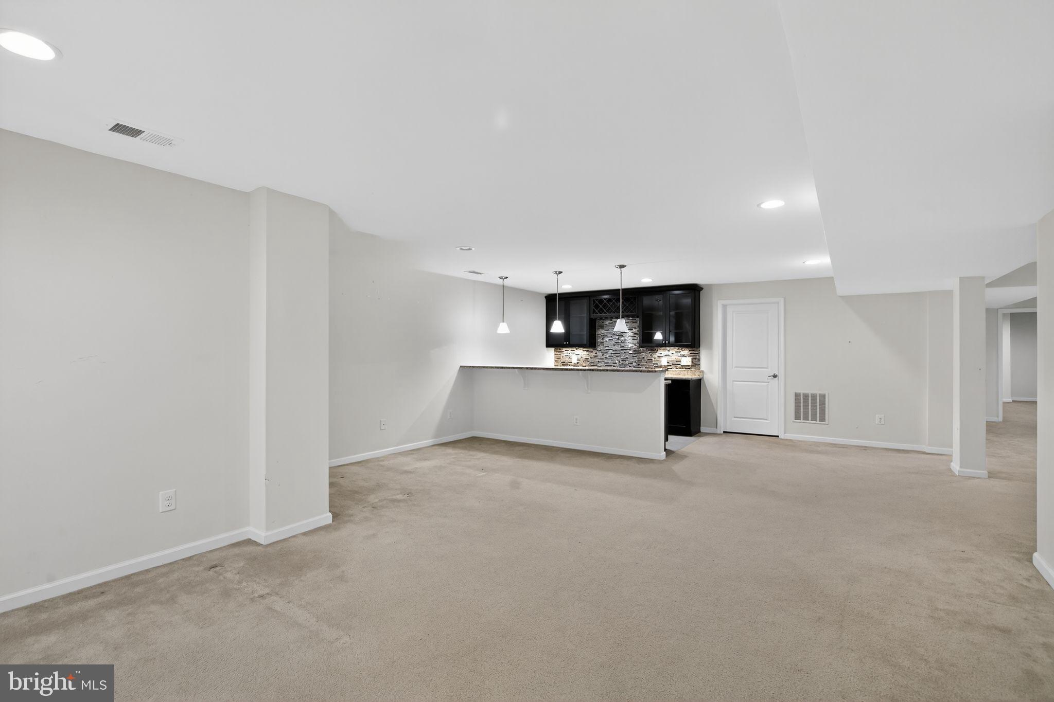 4401 Weejun Loop Woodbridge, VA 22192 - Photo 28 of 35 a view of a kitchen with a sink