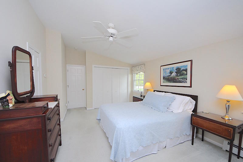 3 Miles Road Darien, CT 06820 - Photo 13 of 32 a bedroom with a bed desk and a window
