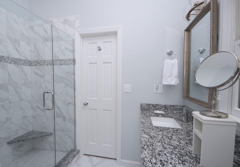 3 Miles Road Darien, CT 06820 - Photo 15 of 32 a bathroom with a sink a toilet and shower