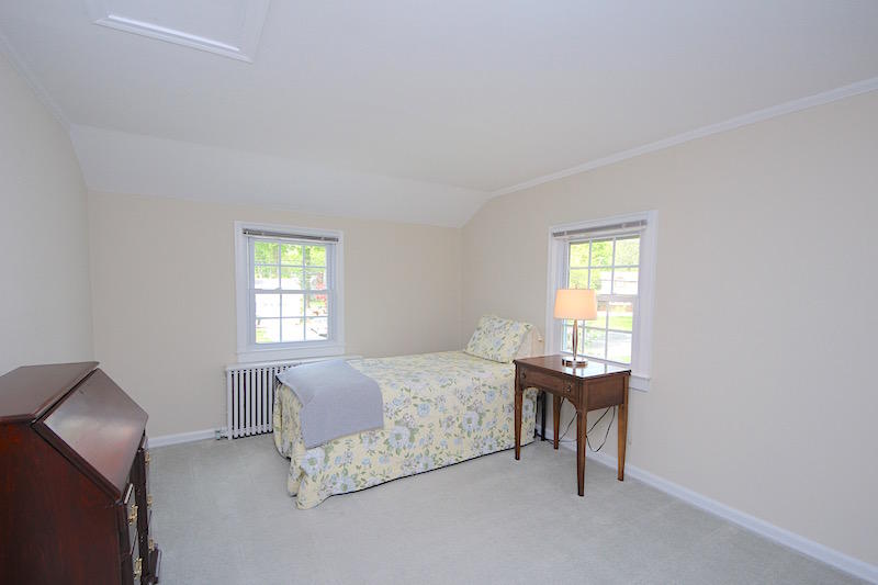 3 Miles Road Darien, CT 06820 - Photo 16 of 32 a bedroom with a bed and a window