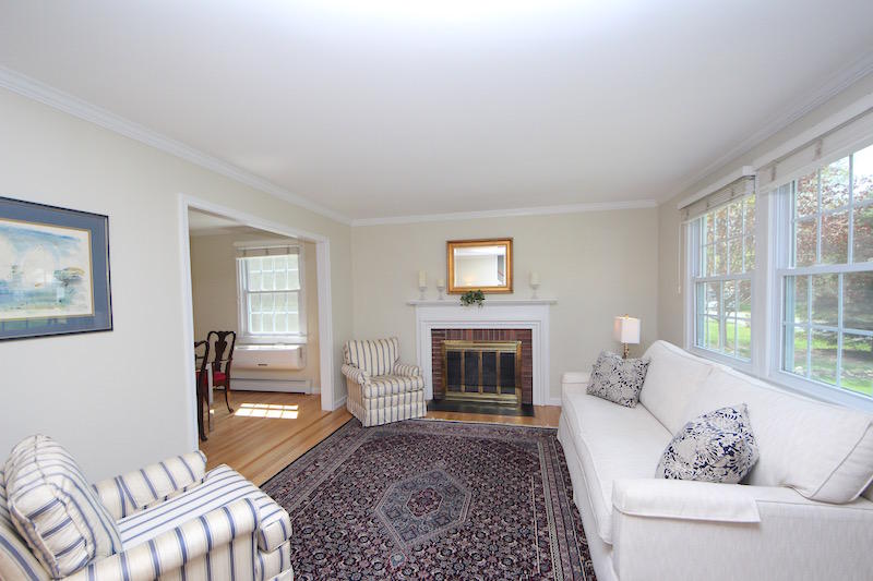 3 Miles Road Darien, CT 06820 - Photo 2 of 32 a living room with furniture and a fireplace