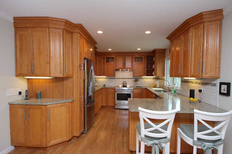 3 Miles Road Darien, CT 06820 - Photo 5 of 32 a kitchen with granite countertop wooden cabinets and stainless steel appliances