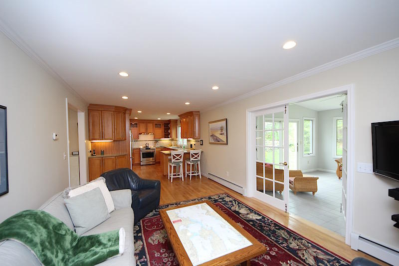 3 Miles Road Darien, CT 06820 - Photo 9 of 32 a living room with furniture and a flat screen tv