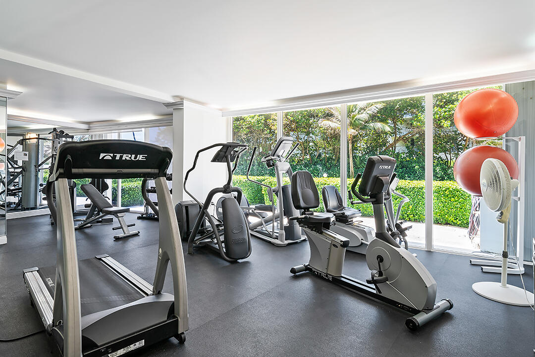 2780 South Ocean Boulevard, Unit 612 Palm Beach, FL 33480 - Photo 12 of 57 a room with gym equipment and large window