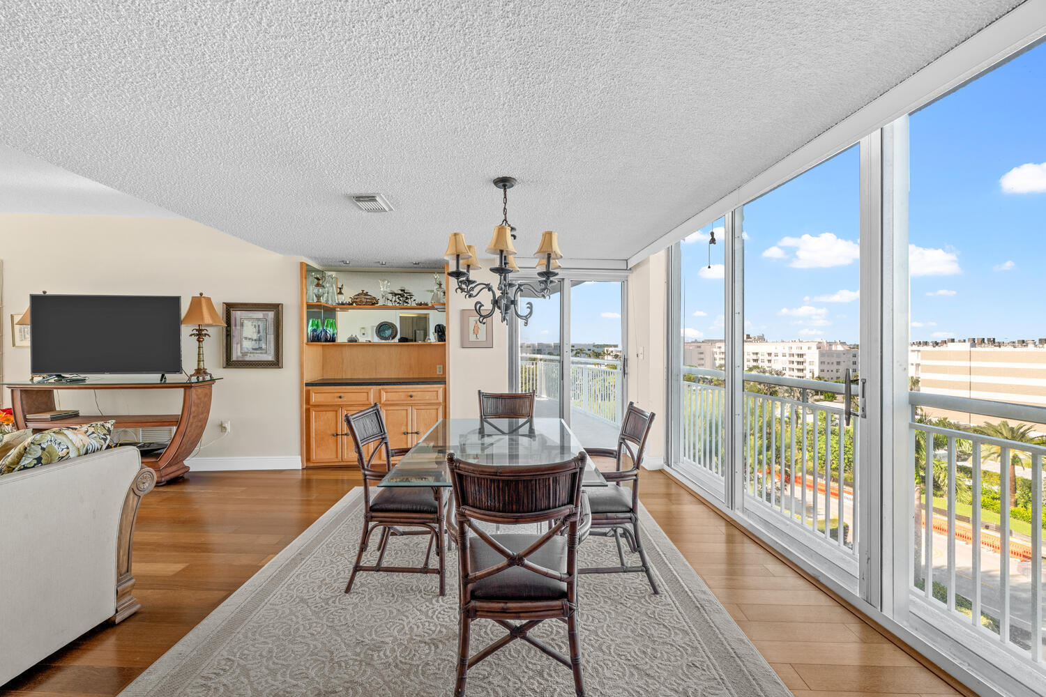 2780 South Ocean Boulevard, Unit 612 Palm Beach, FL 33480 - Photo 17 of 57 a view of a dining room with furniture window and wooden floor