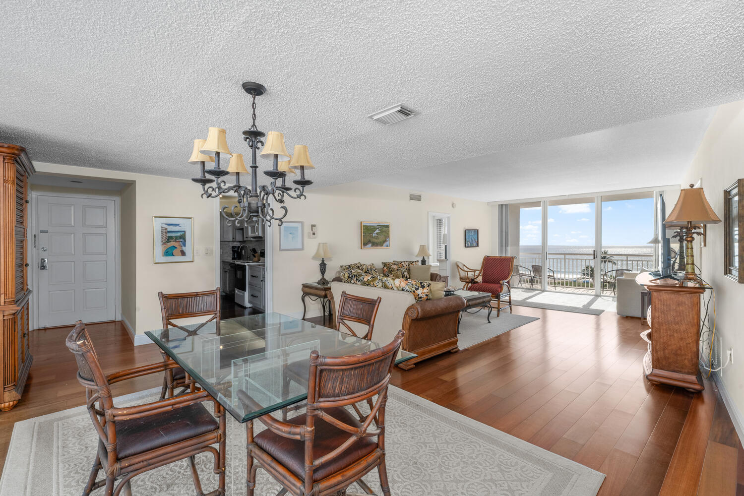 2780 South Ocean Boulevard, Unit 612 Palm Beach, FL 33480 - Photo 19 of 57 a view of a dining room with furniture window and wooden floor