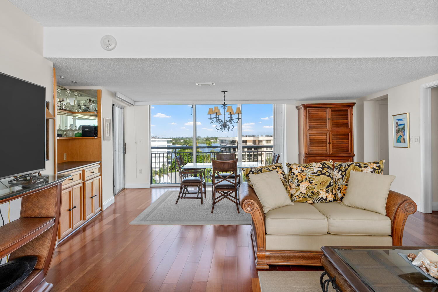 2780 South Ocean Boulevard, Unit 612 Palm Beach, FL 33480 - Photo 28 of 57 a living room with fireplace furniture and a flat screen tv