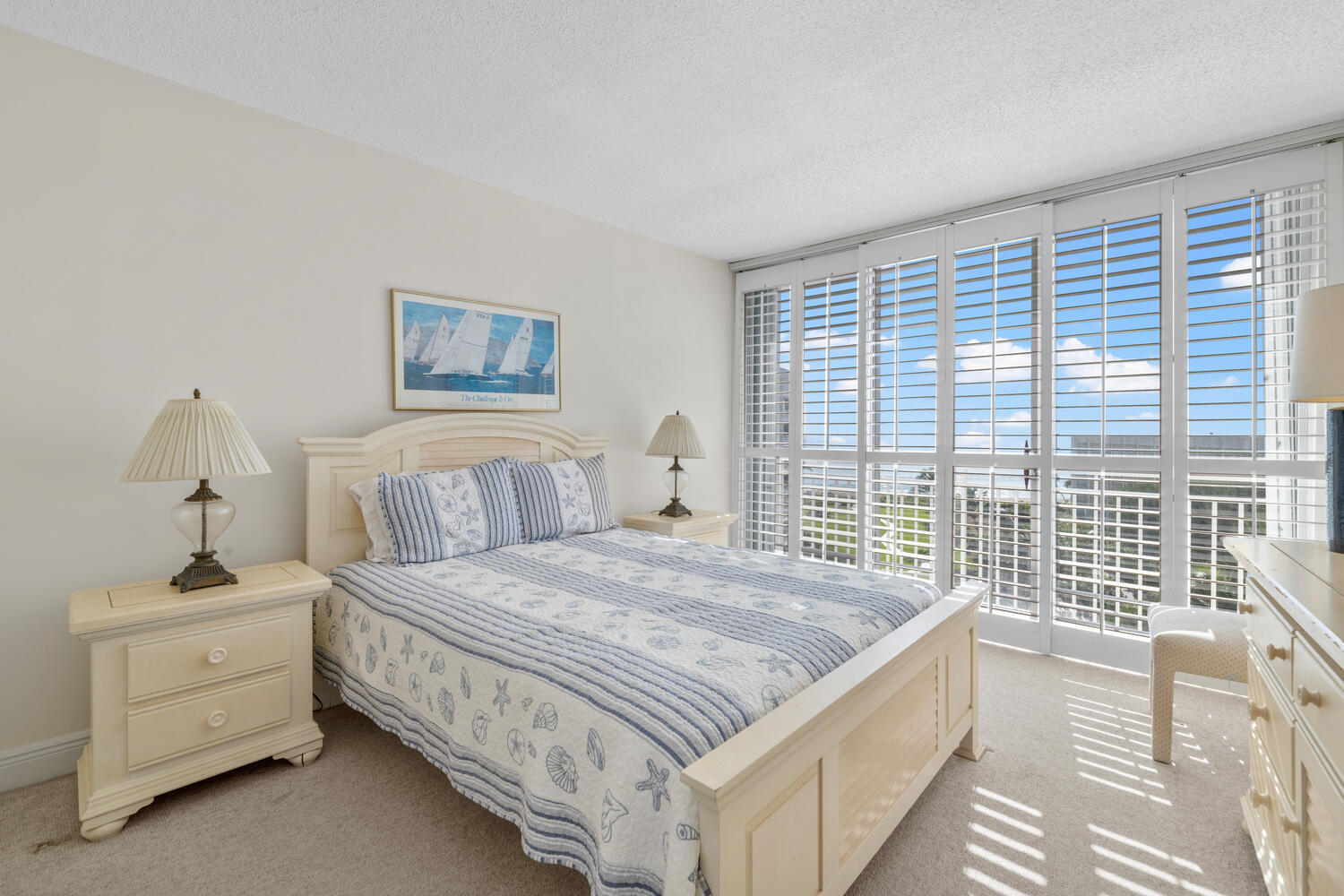 2780 South Ocean Boulevard, Unit 612 Palm Beach, FL 33480 - Photo 31 of 57 a spacious bedroom with a bed and a window