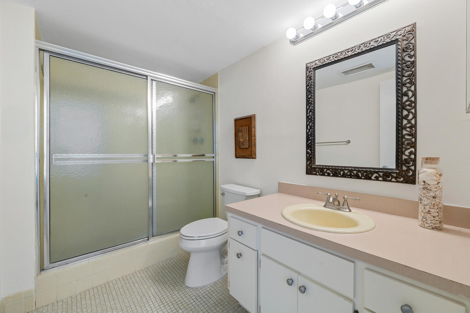 2780 South Ocean Boulevard, Unit 612 Palm Beach, FL 33480 - Photo 34 of 57 a bathroom with a granite countertop sink toilet a mirror and shower